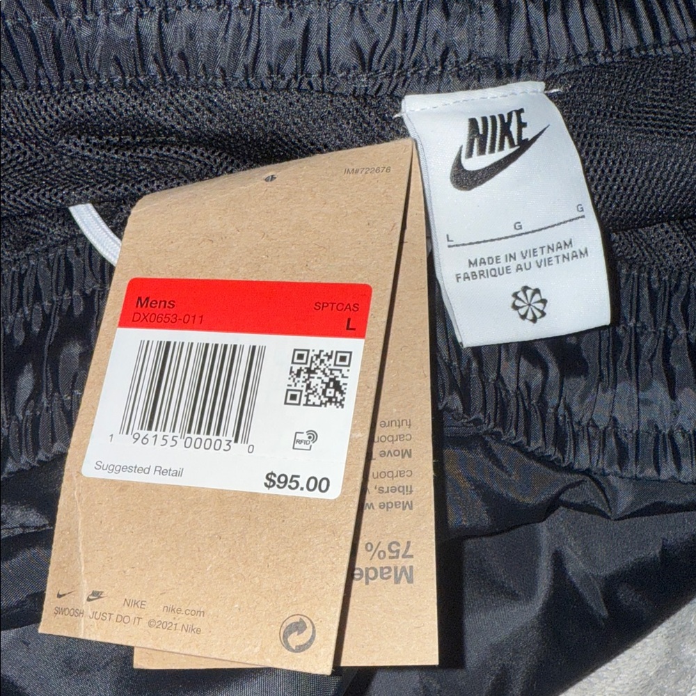 Nike standard fit taper leg regular length Windrunner pants - Picture 5 of 7
